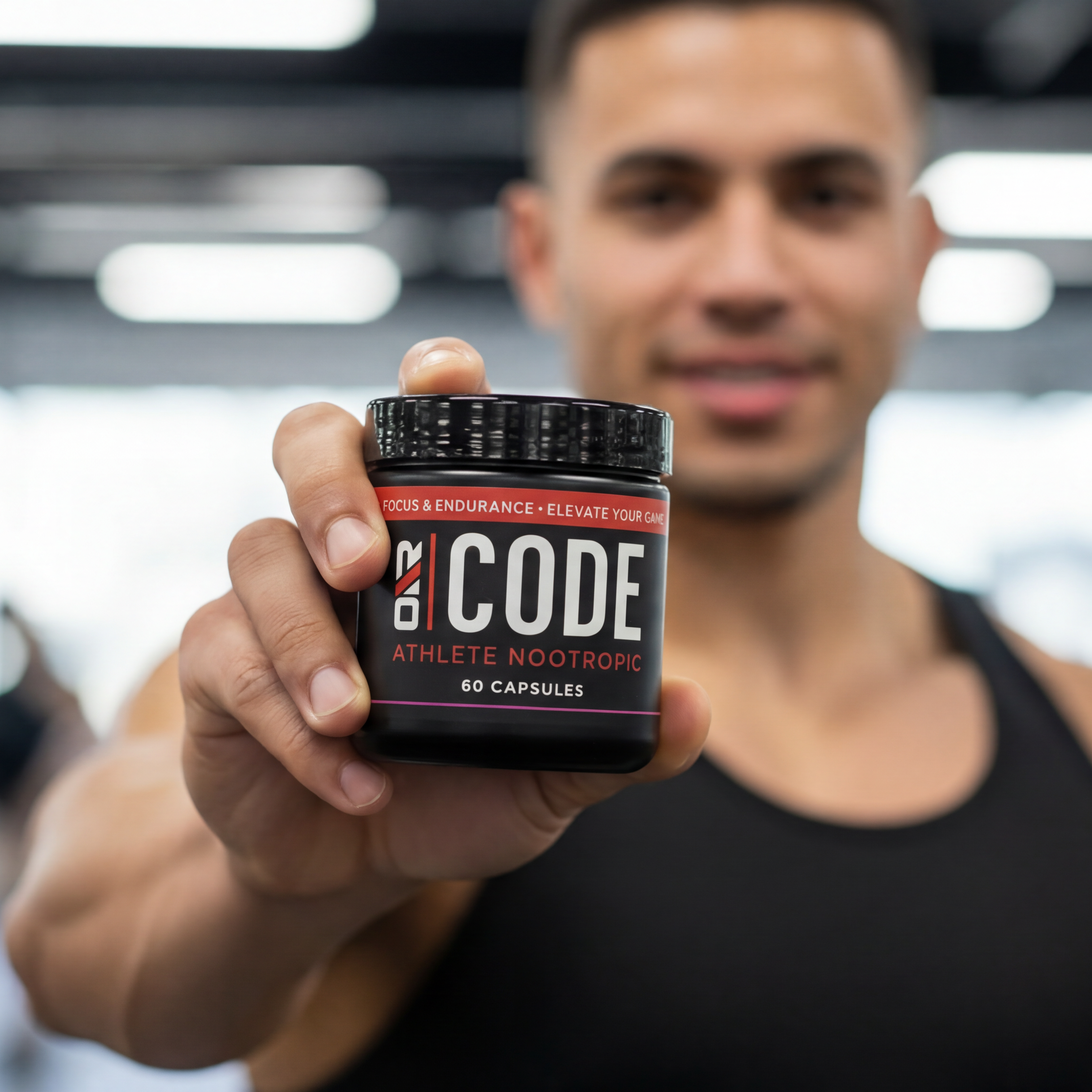 Man holding a container labeled 'CODE' in a gym setting
